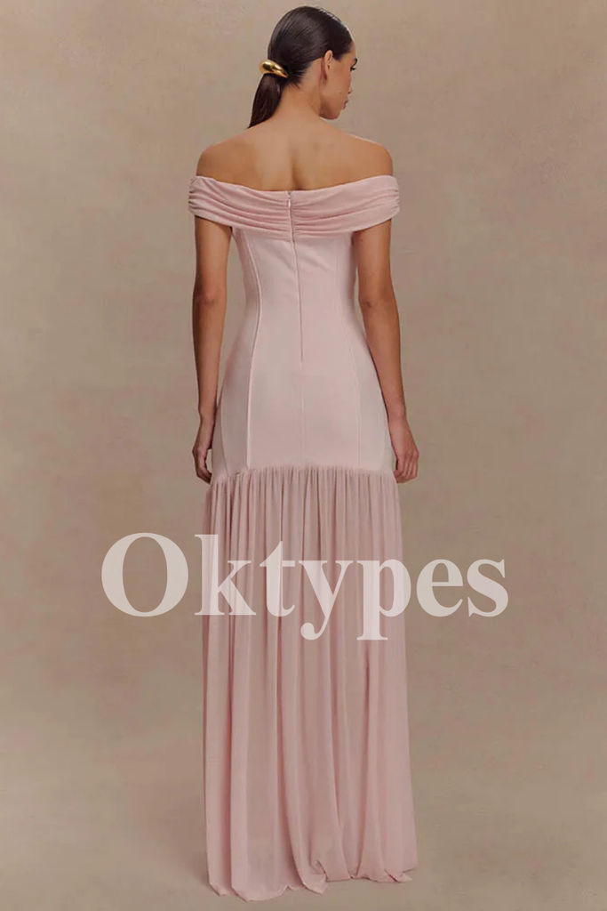 Blush Pink Off-the-Shoulder Prom Dress with Gold Floral Brooch and Pleated Skirt